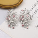 White Street Hollow Out Rhinestone Decor Earrings