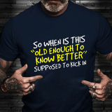 Black SO WHEN IS THIS OLD ENOUGH TO KNOW BETTER SUPPOSED TO KICK IN PRINT T-SHIRT