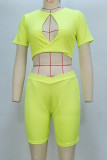 Fluorescent Yellow Sportswear Solid Color Hollow Out Patchwork O Neck Short Sleeve Two Pieces