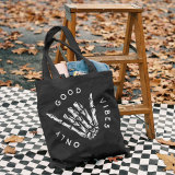 Black ONLY GOOD VIBES AND SKULL HAND PRINTED BAG