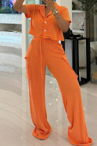 Tangerine Red Casual Solid Color Pocket Lace Up Buckle Patchwork Turndown Collar Short Sleeve Two Pieces