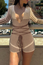 Khaki Sexy Solid Color Patchwork Cross Straps Deep V Neck Skinny Rompers