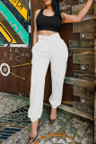 White Casual Solid Color Hollow Out Pocket Patchwork Regular Mid Waist Pencil Patchwork Bottoms