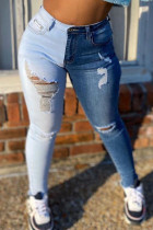 The cowboy blue Casual Color Lump Patchwork Solid Ripped Make Old Pocket Mid Waist Skinny Denim