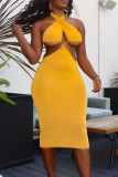 Yellow Fashion Sexy Solid Backless Halter Sleeveless Dress