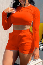 Tangerine Red Fashion Casual Solid Backless Strap Design O Neck Long Sleeve Two Pieces