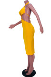 Yellow Fashion Sexy Solid Backless Halter Sleeveless Dress