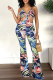Tibetan Blue Sexy Print Hollowed Out Spaghetti Strap Boot Cut Jumpsuits