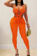 Orange Sexy Solid Color Hollow Out Halter Skinny Jumpsuits