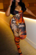 Orange Sexy Print Hollow Out Spaghetti Strap Skinny Jumpsuits