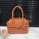 Tangerine Red Textured Emblem Tote Bag Buckle Accent Shoulder Purse