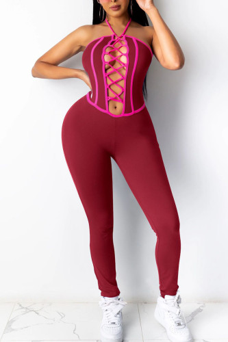 Burgundy Sexy Solid Hollowed Out Split Joint Frenulum Halter Skinny Jumpsuits