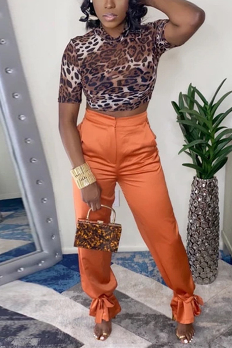 orange velvet trousers