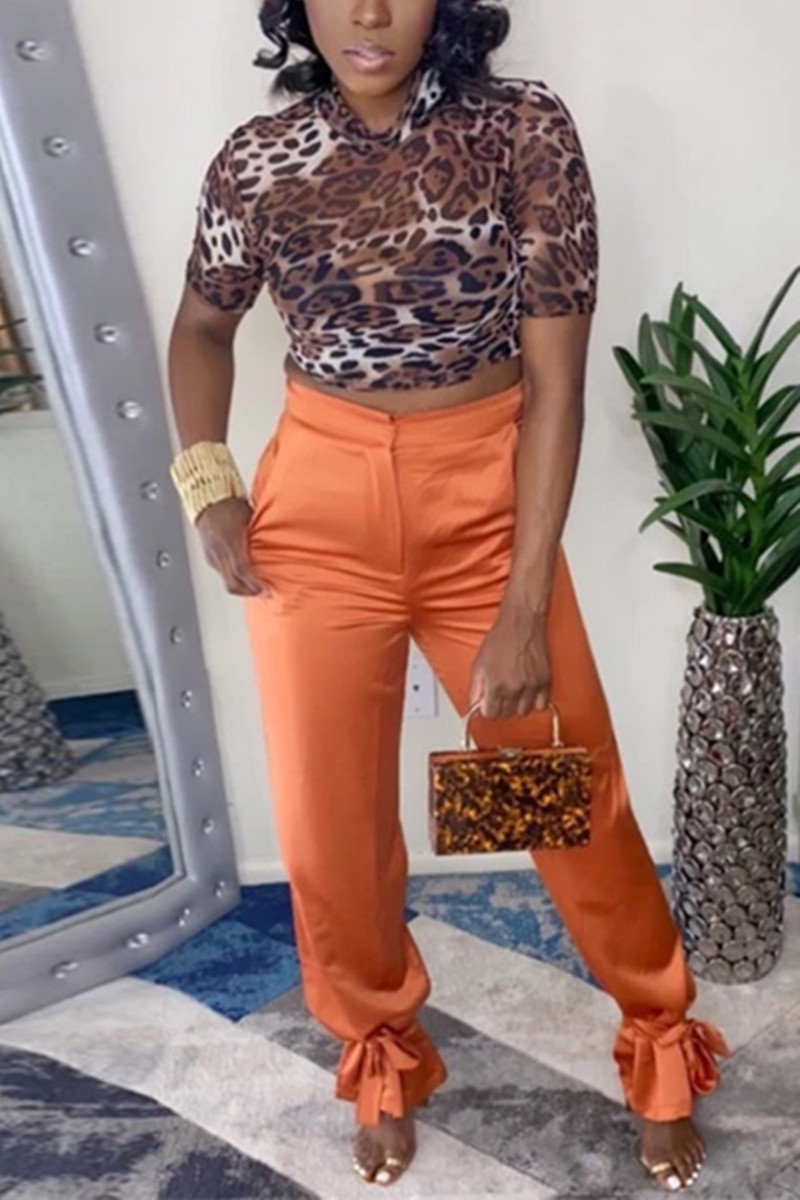 orange velvet trousers