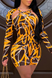 Orange Fashion Sexy Print Hollowed Out O Neck Skinny Jumpsuits