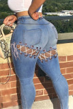 Light Blue Fashion Sexy Solid Hollowed Out High Waist Jeans
