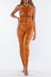 Orange Fashion Sexy Print Hollowed Out Backless Halter Skinny Jumpsuits