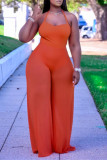 Orange Sexy Casual Solid Patchwork See-through Backless Halter Regular Jumpsuits