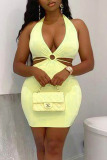 Light Yellow Sexy Solid Hollowed Out Patchwork Frenulum Halter Pencil Skirt Dresses