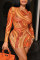 Orange Fashion Sexy Print Hollowed Out O Neck Long Sleeve Dresses