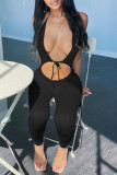 Black Sexy Casual Solid Bandage Hollowed Out Backless Halter Skinny Jumpsuits
