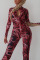 Rose Red Sexy Print Hollowed Out Split Joint Backless O Neck Skinny Jumpsuits