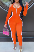 Orange Sexy Solid Patchwork Zipper Halter Skinny Jumpsuits