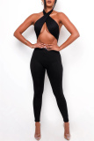 Black Sexy Casual Solid Hollowed Out Backless Halter Skinny Jumpsuits