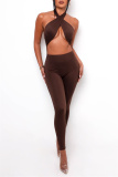 Black Sexy Casual Solid Hollowed Out Backless Halter Skinny Jumpsuits