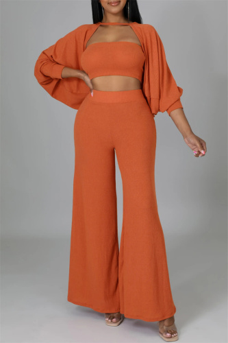 Orange Fashion Casual Solid Hollowed Out Patchwork O Neck Long Sleeve Three-piece Set
