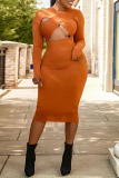 Tangerine Sexy Solid Hollowed Out Patchwork V Neck One Step Skirt Dresses