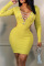 Yellow Sexy Solid Bandage Hollowed Out Split Joint V Neck One Step Skirt Dresses