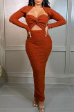 Orange Fashion Sexy Solid Hollowed Out Patchwork Long Sleeve Dresses
