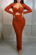 Orange Fashion Sexy Solid Hollowed Out Split Joint Long Sleeve Dresses