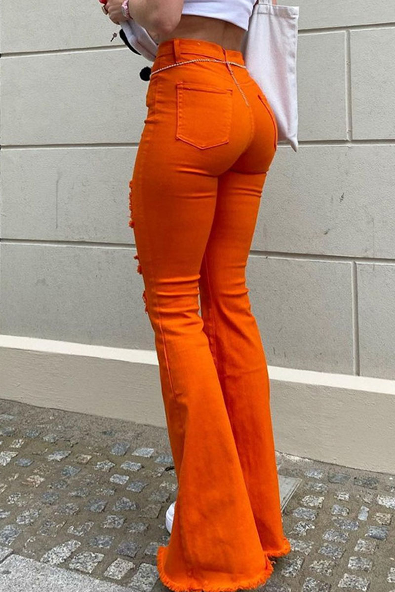 orange ripped jeans