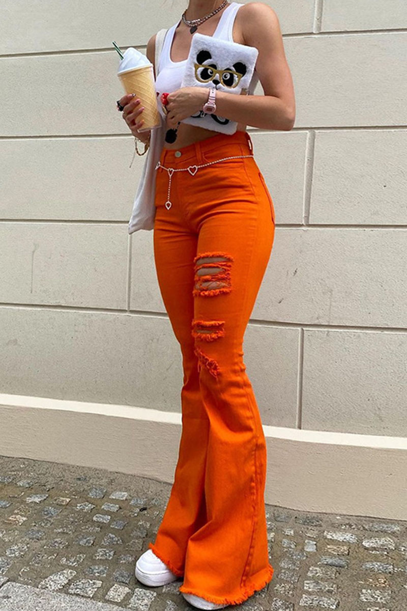 orange ripped jeans