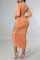 Tangerine Sexy Solid Patchwork V Neck One Step Skirt Dresses