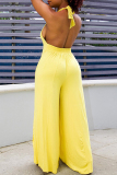Yellow Sexy Casual Solid Bandage Backless Halter Regular Jumpsuits