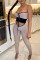 Champagne Sexy Solid Bandage Hollowed Out Split Joint Strapless Skinny Jumpsuits