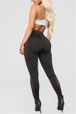 Black Fashion Sexy Casual Solid Patchwork See-through Skinny High Waist Pencil Trousers