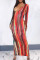 Red Fashion Street Striped Patchwork V Neck One Step Skirt Dresses