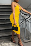 Yellow Sexy Solid Hollowed Out Patchwork Halter One Step Skirt Dresses