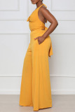 Yellow Sexy Solid Bandage Patchwork Backless Straight Jumpsuits