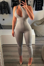 Grey Sexy Casual Solid Hollowed Out Backless Oblique Collar Skinny Jumpsuits