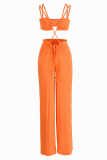 Orange Sexy Solid Hollowed Out Patchwork Spaghetti Strap Straight Jumpsuits