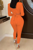 Tangerine Red Sexy Solid Bandage Hollowed Out Patchwork Asymmetrical Turn-back Collar Long Sleeve Two Pieces