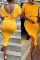 Yellow Sexy Casual Solid Chains Backless Slit Boat Neck Sheath Dresses