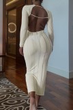 Khaki Sexy Casual Solid Backless O Neck Long Sleeve Dresses