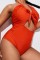 Tangerine Red Sexy Solid Hollowed Out Backless Halter Plus Size Swimwear (With Paddings)