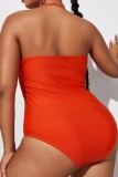Tangerine Red Sexy Solid Hollowed Out Backless Halter Plus Size Swimwear (With Paddings)